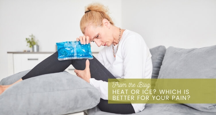Woman holding ice pack on one shoulder and heating pad on the other.